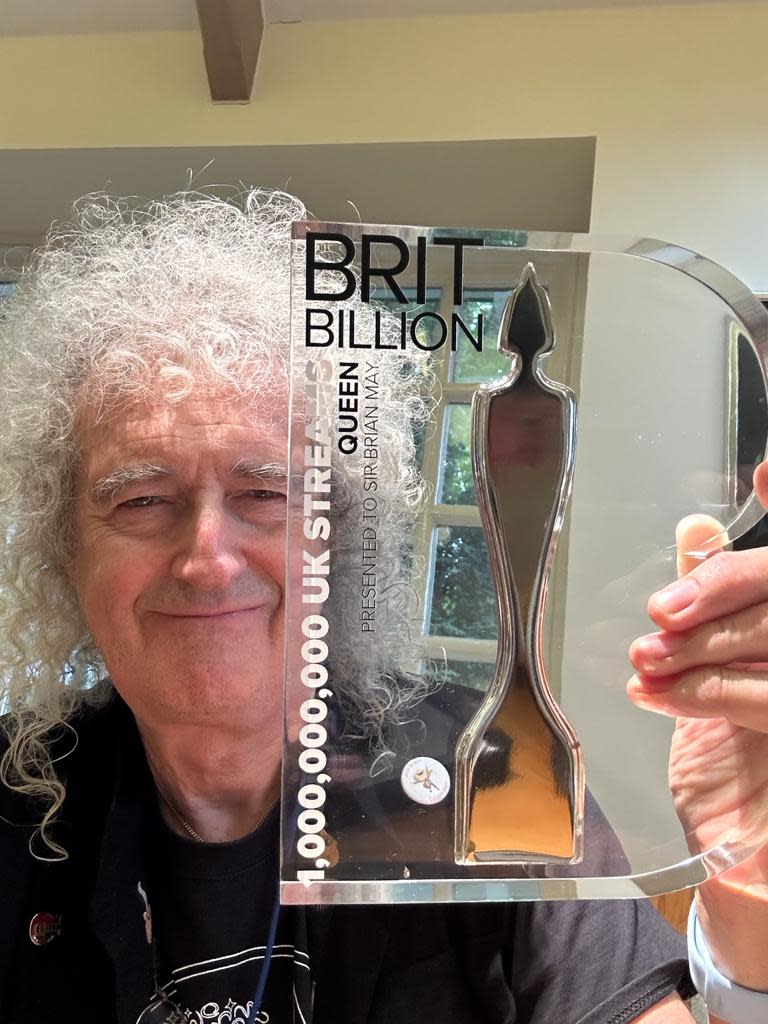 Brian May with the Brit award (BPI/PA)