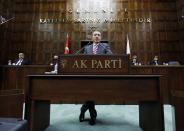 <p>Turkey’s Prime Minister Tayyip Erdogan addresses members of parliament from his ruling AK Party (AKP) during a meeting at the Turkish parliament in Ankara January 5, 2010. (Umit Bektas/Reuters) </p>