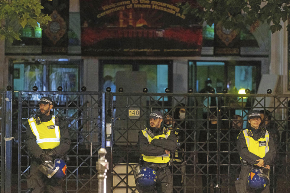 View of the scene where protesters clashed with police outside the Kilburn Islamic Centre in London, Sunday, Sept. 25, 2022. They were protesting against the death of Iranian Mahsa Amini, a 22-year-old woman, who died in Iran while in police custody, was arrested by Iran's morality police for allegedly violating its strictly-enforced dress code. (David Parry/PA via AP)