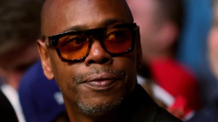 Dave Chappelle looks on during UFC 264: Poirier v McGregor 3 at T-Mobile Arena in July 2021 in Las Vegas. (Photo: Stacy Revere/Getty Images)