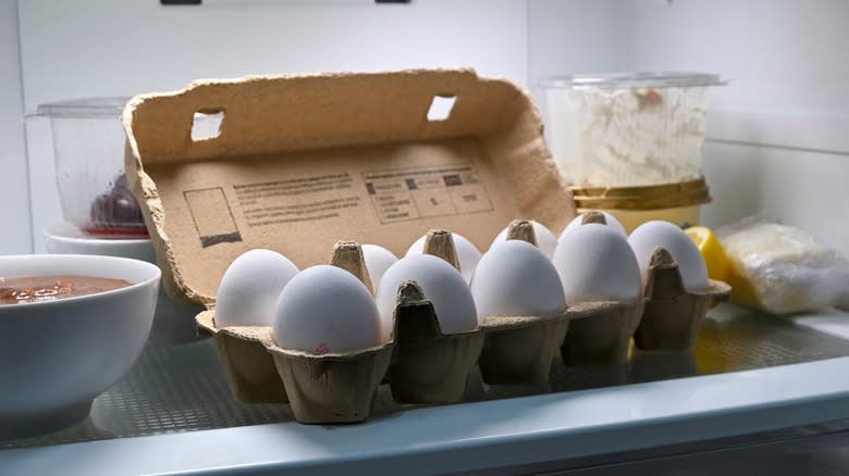 eggs in carton in fridge