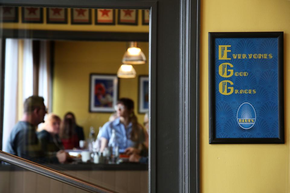 Customers dine at Blue’s Egg, a breakfast and lunch restaurant, at 317 N. 76th St.