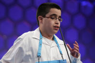 <p>Julian Joseph Connaughton of Shohola, Pa., spells his word during round two of 2017 Scripps National Spelling Bee. (Alex Wong/Getty Images) </p>