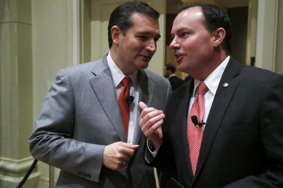 Sen. Ted Cruz, R-Texas, left, has a word with Sen. Mike Lee, R-Utah, after Cruz spoke at the Susan B. Anthony List "Campaign for Life Gala and Summit", a gathering of anti-abortion advocates, in Washington, Wednesday, March 12, 2014. Looking to aid political candidates who share their views, anti-abortion activists are auditioning potential 2016 presidential contenders. Like many evangelicals, the Susan B. Anthony List is in search of an anti-abortion crusader who has a shot at winning the Republican nomination in 2016 after back-to-back presidential nominees that left the socially conservative wing of the GOP ambivalent at best.(AP Photo/Charles Dharapak)