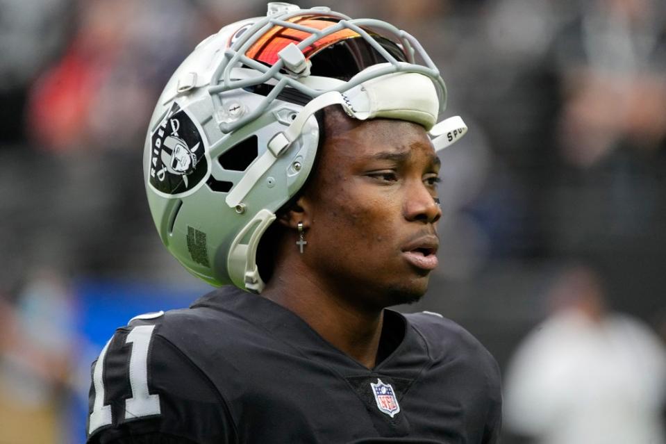 Raiders wide receiver Henry Ruggs III walks on the field before an NFL football game against the Chicago Bears, Oct. 10, 2021, in Las Vegas. AP