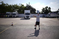 Instructor Graham Bolger directs learner truck driver Cadhene Lubin-Hewitt as he drives at the National Driving Centre in Croydon, south London, Wednesday, Sept. 22, 2021. Lubin-Hewitt, 32, moved to the UK when he was 16 from Trinidad and Tobago and has been driving buses and coaches for about 10 years. Britain doesn't have enough truck drivers. The shortage is contributing to scarcity of everything from McDonald's milkshakes to supermarket produce. (AP Photo/Matt Dunham)