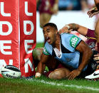 Michael Jennings slams the ball down for NSW's second try.