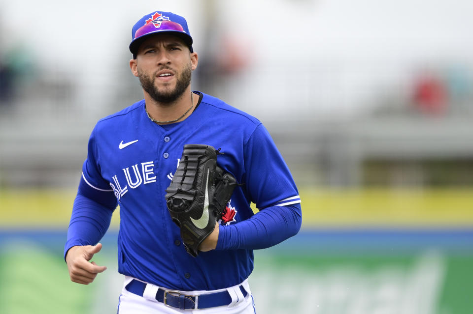 DUNEDIN, FLORIDA - MARCH 21: George Springer #4 of the Toronto Blue Jays jogs off the field during the fifth inning against the New York Yankees during a spring training game at TD Ballpark on March 21, 2021 in Dunedin, Florida. (Photo by Douglas P. DeFelice/Getty Images)