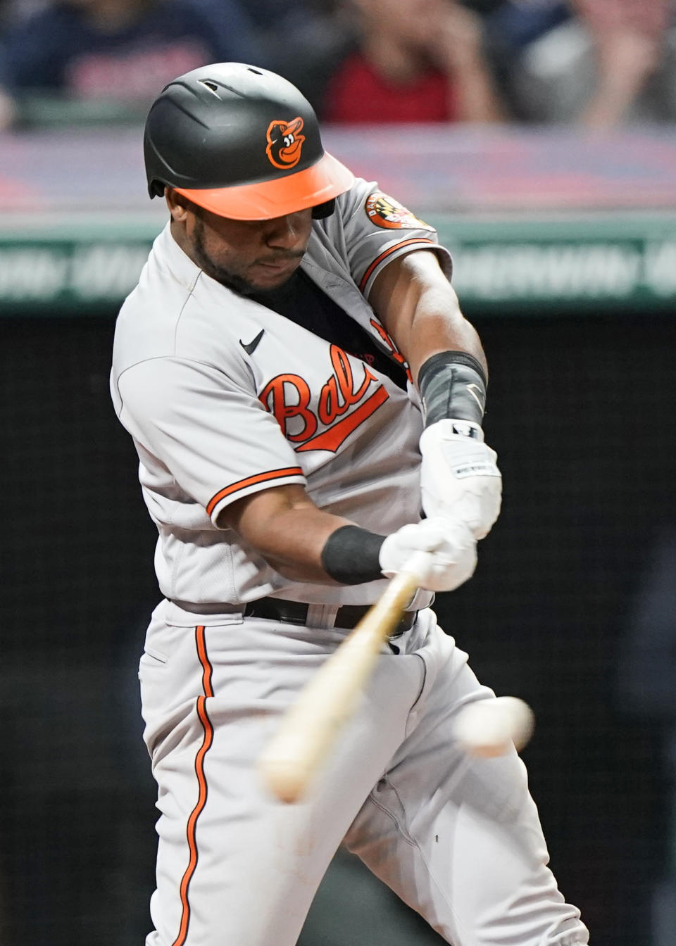 Baltimore Orioles' Maikel Franco hits an RBI single during the seventh inning of the team's baseball game against the Cleveland Indians, Wednesday, June 16, 2021, in Cleveland. (AP Photo/Tony Dejak)