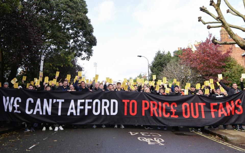 Fulham supporters protest over ticket prices ahead of the Premier League match between Fulham FC and Manchester United at Craven Cottage on November 4, 2023