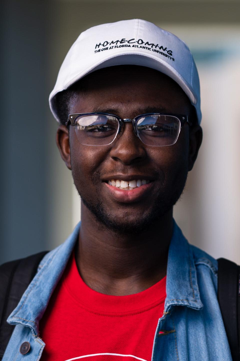 Dodlee Mosilme, a Florida Atlantic University student from Lake Worth Beach, poses for a portrait at Florida Atlantic University on Wednesday, October 25, 2022, in Boca Raton, FL. Mosilme is part of the Kelly/Strul Emerging Scholars Program, which pays the college costs - tuition, books, housing and meals - of first-generation, low-income students so they can graduate debt free.