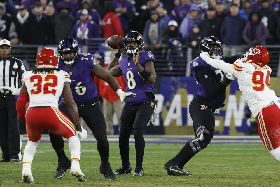 Jan 28, 2024; Baltimore, Maryland, USA; Baltimore Ravens quarterback Lamar Jackson (8) prepares to throw the ball during the second half against the Kansas City Chiefs in the AFC Championship football game at M&T Bank Stadium. Mandatory Credit: Geoff Burke-USA TODAY Sports