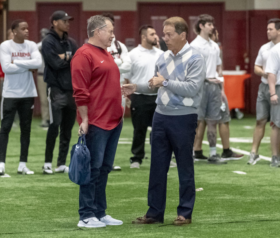 New England Patriots head coach Bill Belichick, left, talks with Alabama football coach Nick Saban at Alabama's NFL Pro Day, Tuesday, March 19, 2019, in Tuscaloosa, Ala. (AP Photo/Vasha Hunt)