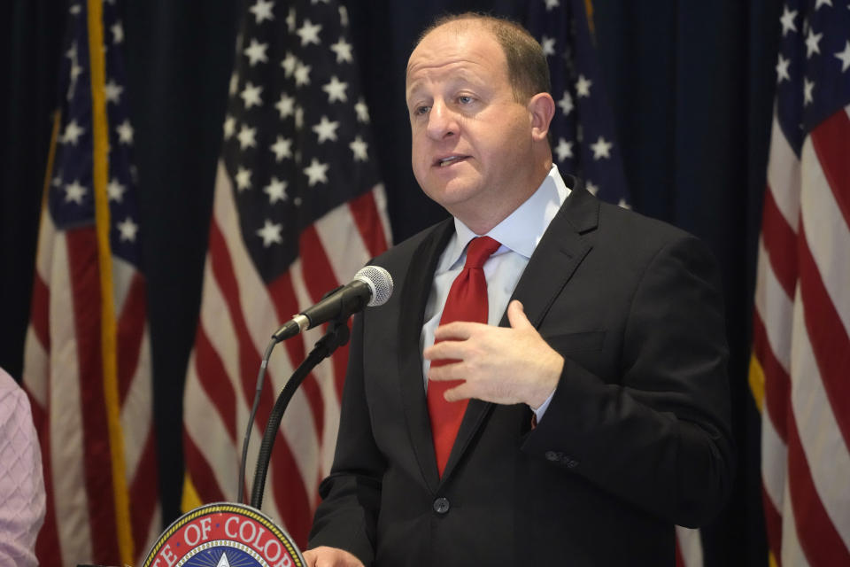 Colorado Gov. Jared Polis makes a point during a news conference after unveiling his balanced state budget proposal for fiscal year 2023-24 Tuesday, Nov. 1, 2022, at the governor's mansion in Denver. (AP Photo/David Zalubowski)