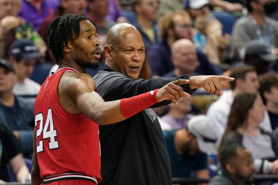 Louisville head coach Kenny Payne, right talks with forward Jae'Lyn Withers (24) during the first half of an NCAA college basketball game against Boston College at the Atlantic Coast Conference Tournament in Greensboro, N.C., Tuesday, March 7, 2023. (AP Photo/Chuck Burton)