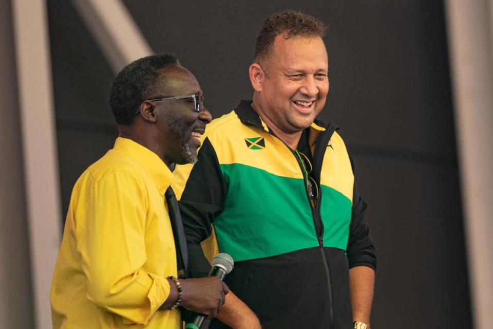 Comedian Owen “Blakka” Ellis (left) speaks with Miami Jamaican Consul General Oliver Mair on stage during the Jamaica Emancipendence Ole Time Fair at Miramar Regional Park Amphitheater in Miramar, Florida on Saturday, August 6, 2022. The free family-friendly event included kids trampolines, farmers market and dancing in celebration of Jamaica’s 60th Independence Anniversary.