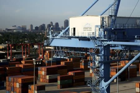 Containers await departure as crews load and unload consumer products at the Port of New Orleans along the Mississippi River in New Orleans, Louisiana June 23, 2010. REUTERS/Sean Gardner