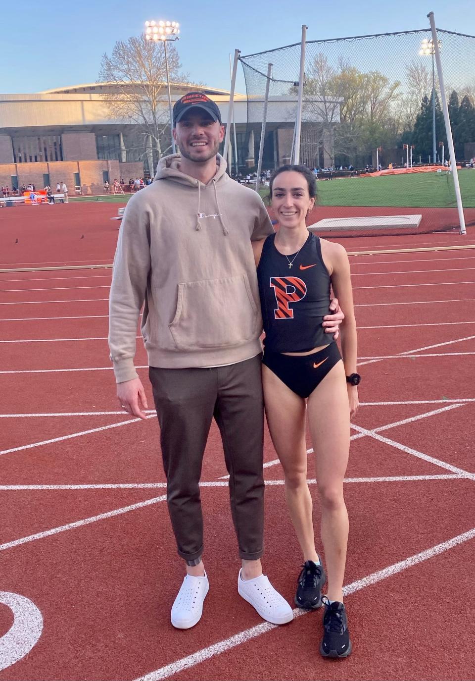 Luke and Caroline Timm pose for a photograph at Princeton's Weaver Stadium after Caroline competed in the Larry Ellis Track and Field Invitational.