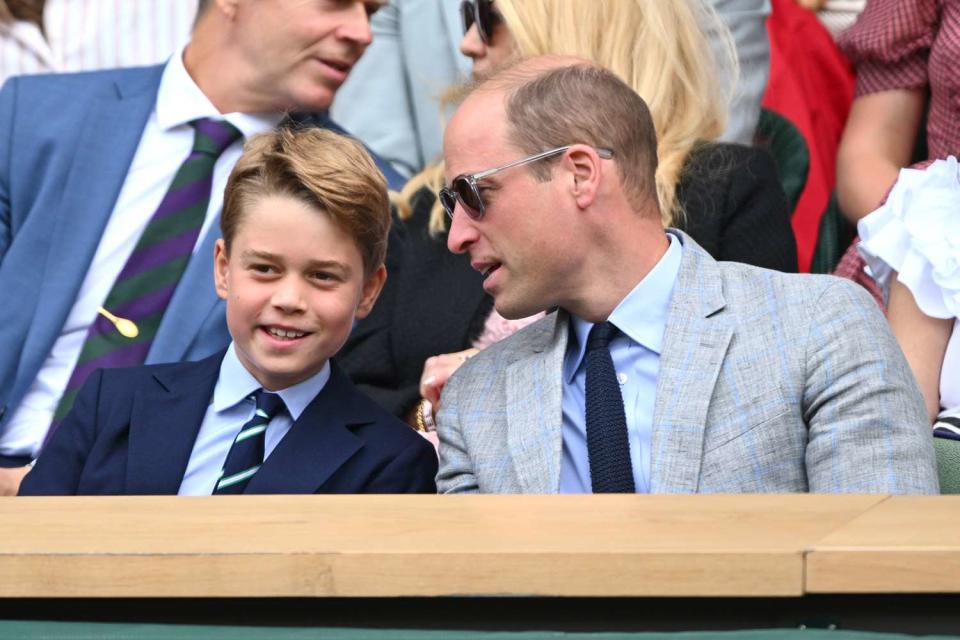 <p>Karwai Tang/WireImage</p> Prince George and Prince William at Wimbledon on July 16, 2023.