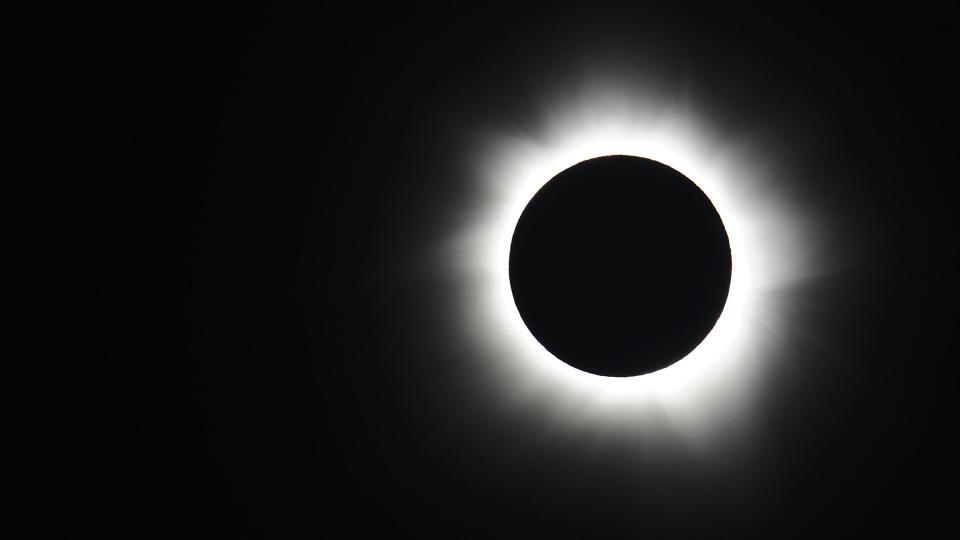 Totality is seen during the Palm Cove solar eclipse on November 14, 2012 in Palm Cove, Australia.  Thousands of solar eclipsers have gathered in one part of North Queensland to enjoy the eclipse, the first in Australia in a decade.