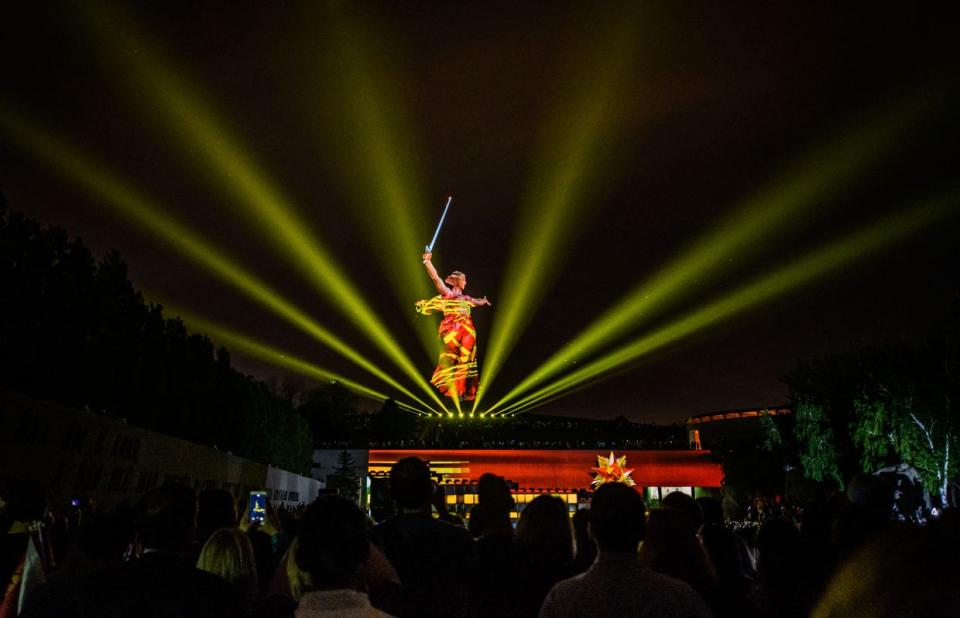 People watch a light show on the occasion of the 73rd anniversary of the end of World War II at The Motherland Calls statue at the Mamayev Kurgan Memorial Complex in Volgograd, on May 8, 2018. (Mladen Antonov /AFP via Getty Images)