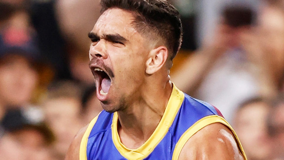 Brisbane's Charlie Cameron is pictured celebrating after kicking a goal.