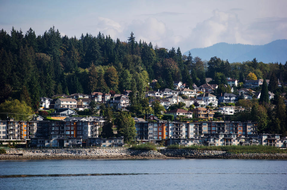 Residential condo buildings and single family houses are seen above Burrard Inlet in North Vancouver, British Columbia, Canada, on Wednesday, Sept. 19, 2018. U.S. Trade Representative Robert Lighthizer and Canadian Foreign Minister Chrystia Freeland met Thursday in Washington to negotiate Nafta talks, but no agreement was reached. Photographer: Darryl Dyck/Bloomberg via Getty Images