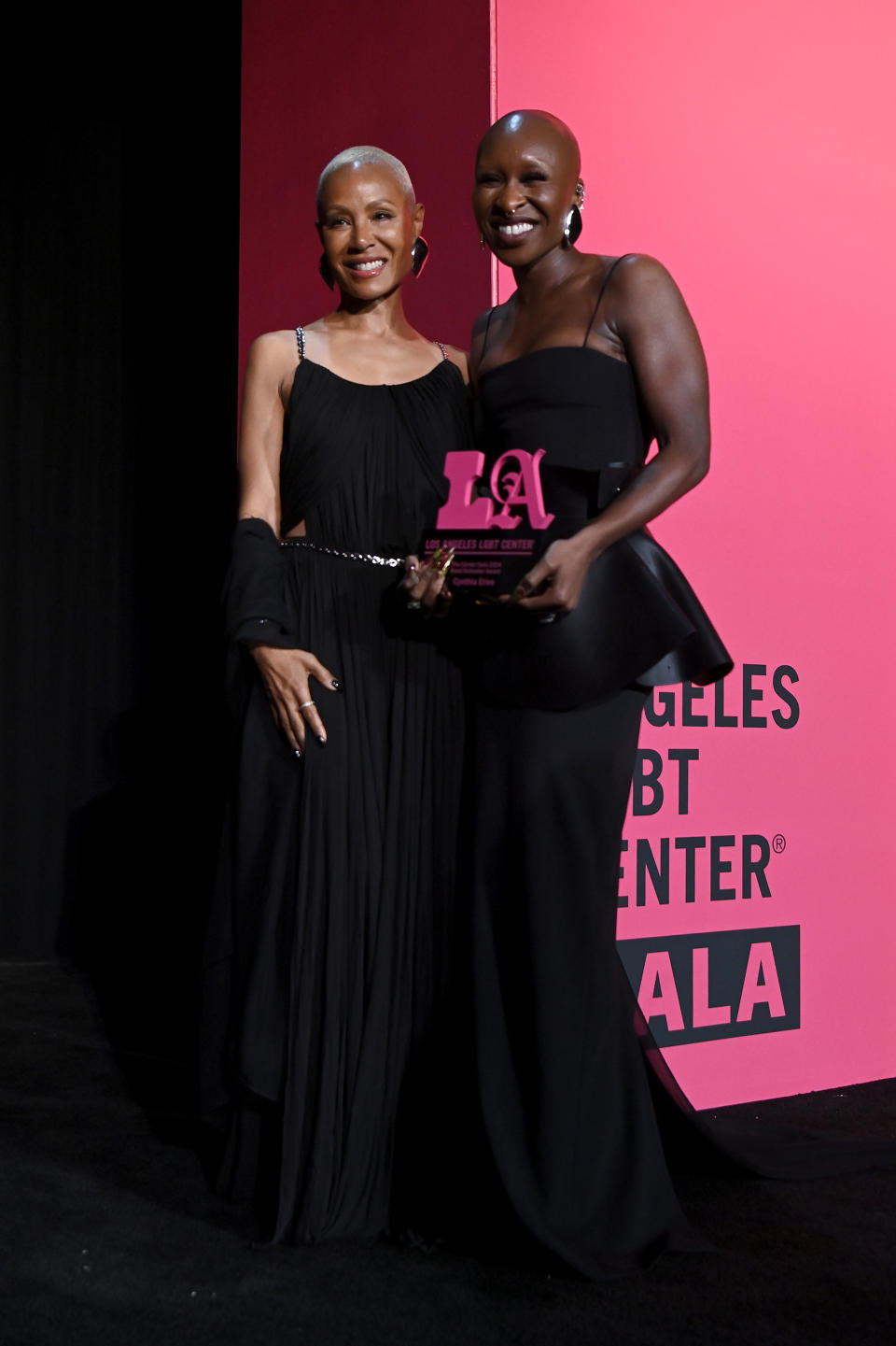 Jada Pinkett Smith and Cynthia Erivo pose for a photo onstage during the Los Angeles LGBT Center's Annual Gala