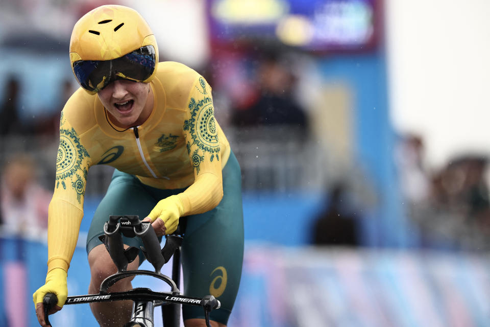 Australia's Grace Brown cycles to cross the finish line of the women's road cycling individual time trial during the Paris 2024 Olympic Games in Paris, on July 27, 2024. (Photo by Anne-Christine POUJOULAT / AFP) (Photo by ANNE-CHRISTINE POUJOULAT/AFP via Getty Images)