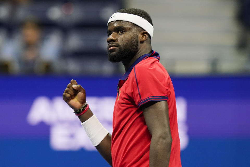 Frances Tiafoe, of the United States, reacts after winning the second game in the fifth set against Andrey Rublev, of Russia, at the third round of the US Open tennis championships, Saturday, Sept. 4, 2021, in New York. (AP Photo/Frank Franklin II)