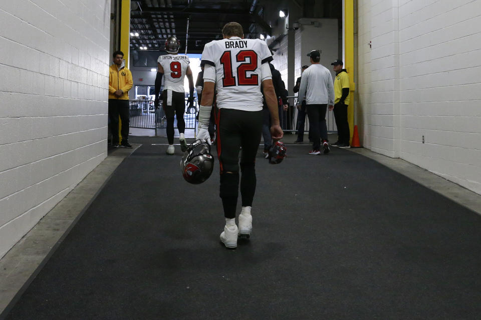 Tom Brady of the Tampa Bay Buccaneers walks to the locker room after losing to the Pittsburgh Steelers