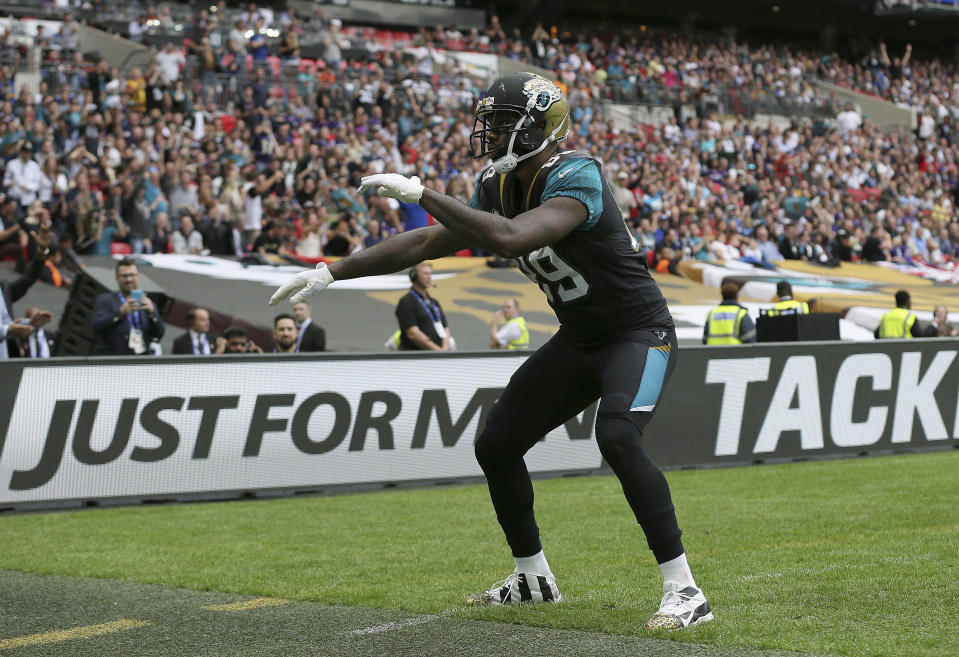 It’s a good day to be Marcedes Lewis. (AP Photo/Tim Ireland)