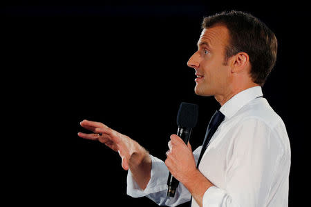 French President Emmanuel Macron holds a town hall meeting with students at George Washington University in Washington, U.S., April 25, 2018. REUTERS/Brian Snyder