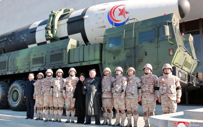 Kim Jong-un and his daughter pose in front of the Hwasong-17 ‘monster missile’ - KCNA/Reuters