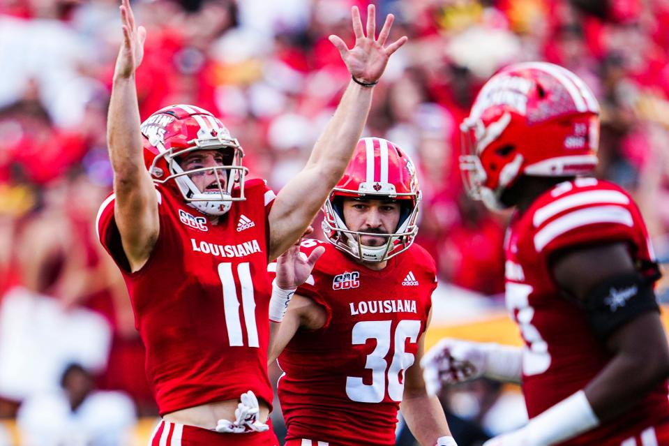 Dec 4, 2021; Lafayette, LA, USA; Louisiana Ragin Cajuns  wide receiver Dalen Cambre (11) celebrates after a field goal during the second quarter against the Appalachian State Mountaineers during the Sun Belt Conference championship game. Mandatory Credit: Andrew Wevers-USA TODAY Sports