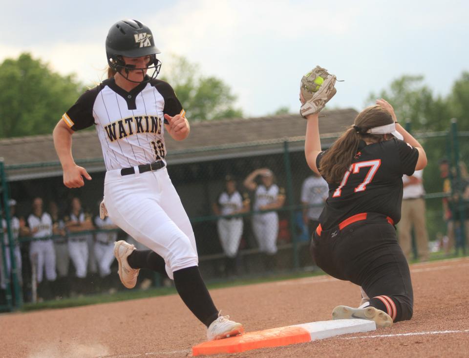 Watkins Memorial's Cortney Dobbs nearly beats the throw to first against Mount Vernon on Friday.
