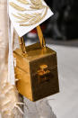 <p>A gold cube bag from the Oscar de la Renta FW18 show. (Photo: Getty Images) </p>