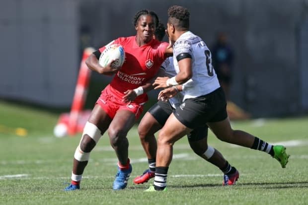 Canadian rugby player Pamphinette Buisa, left, says the decision to file a group complaint in January was to highlight larger organizational issues within Rugby Canada. (@RugbyCanada/Twitter - image credit)