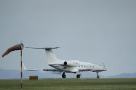 A private jet with Spain's former King Juan Carlos on board taxis after landing at the Peinador airport in Vigo, north western Spain, Thursday, May 19, 2022. Spain's former King has returned to Spain Thursday for his first visit since leaving nearly two years ago amid a cloud of financial scandals. (AP Photo/Lalo R. Villar)