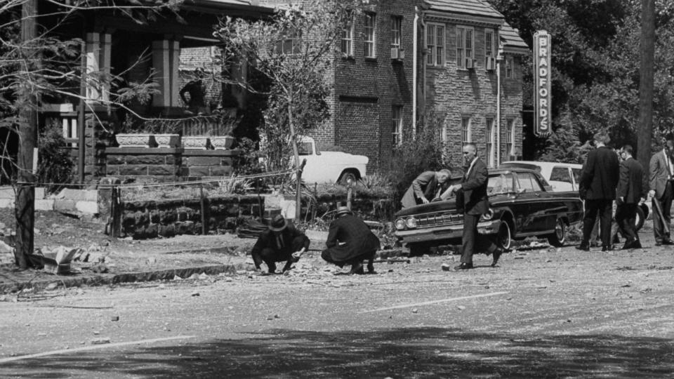 PHOTO: FBI agents investigate the aftermath of the 16th Street Baptist Church bombing, Sept. 16, 1963, in Birmingham, Ala. (Burton Mcneely/Getty Images)