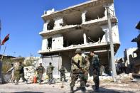 Syrian pro-government forces gather in east Aleppo in an ongoing operation to recapture the city on December 4, 2016