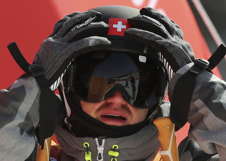 Freestyle Skiing - Pyeongchang 2018 Winter Olympics - Men's Ski Slopestyle Qualifications - Phoenix Snow Park - Pyeongchang, South Korea - February 18, 2018 - Fabian Boesch of Switzerland reacts after run. REUTERS/Mike Blake