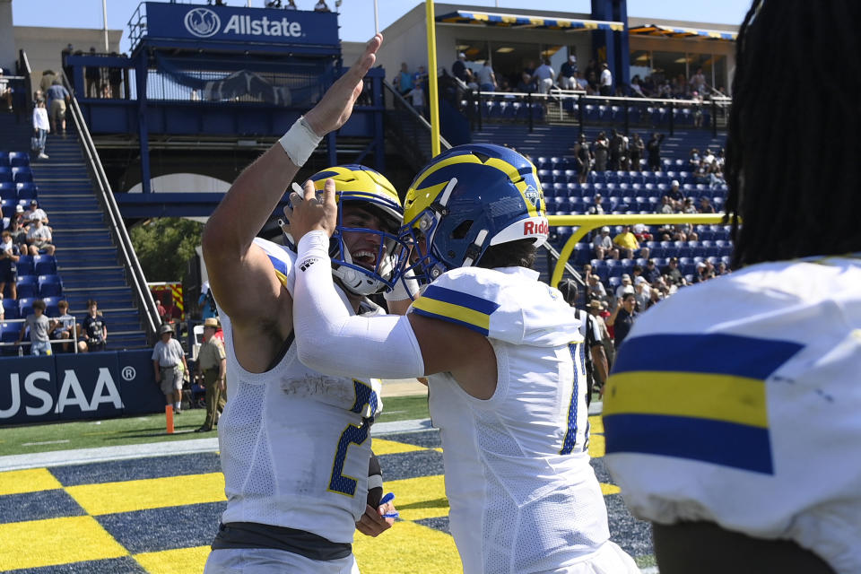 Delaware quarterback Nolan Henderson (2) celebrates after an NCAA college football game against Navy, Saturday, Sept. 3, 2022, in Annapolis, Md. Delaware won 14-7. (AP Photo/Nick Wass)