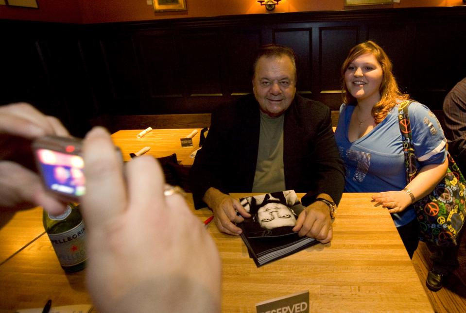 In this 2010 photo, actor Paul Sorvino poses for a picture with fan Samantha Budynkiewicz, then 18, of Wilmington, at a meet and autograph event at the BBC Tavern in Greenville. Sorvino was at the evening event promoting his new line of red sauces.