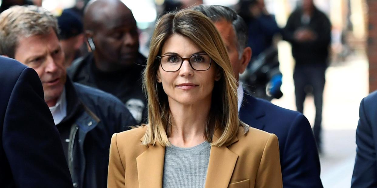 Actor Lori Loughlin leaves the federal courthouse after facing charges in a nationwide college admissions cheating scheme in Boston.JPG