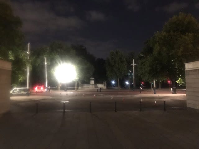 Police on The Mall near Buckingham Palace in London, where a man has been arrested