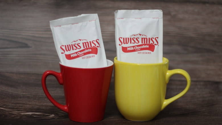 Mugs with hot chocolate powder