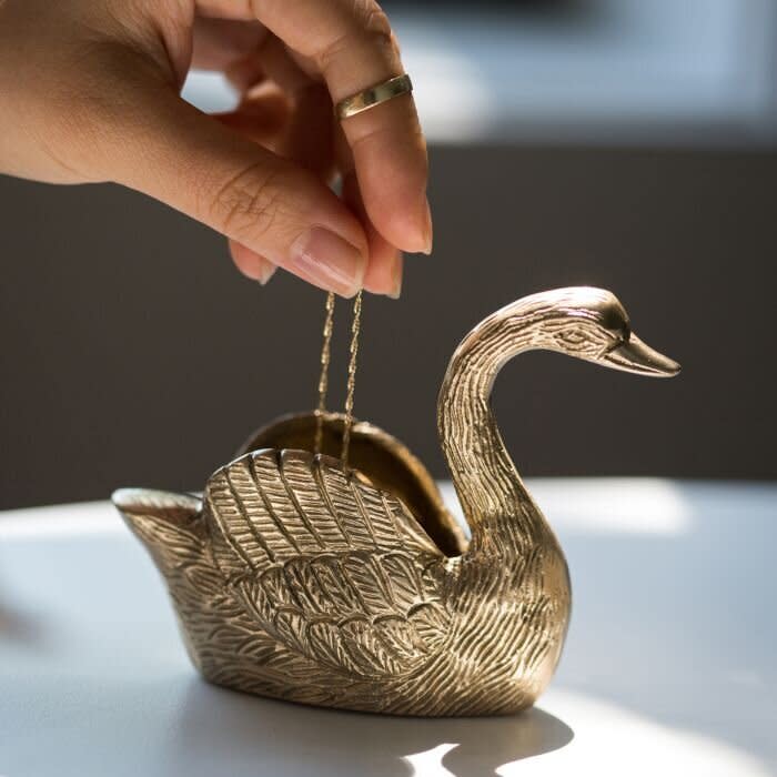 Guard her gems with this swan.&nbsp;<strong><a href="https://fave.co/38au5o1" target="_blank" rel="noopener noreferrer">Get it at Catbird</a></strong>.&nbsp;