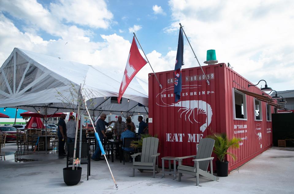After Hurricane Ian destroyed their restaurant building on Fort Myers Beach, owners Lisa Lahners and TJ Holzapfel brought their shipping containers from their former home in Nebraska. Now they have settled at Moss Marina, where they serve their Hawaiian fusion food and host musicians to entertain their customers.