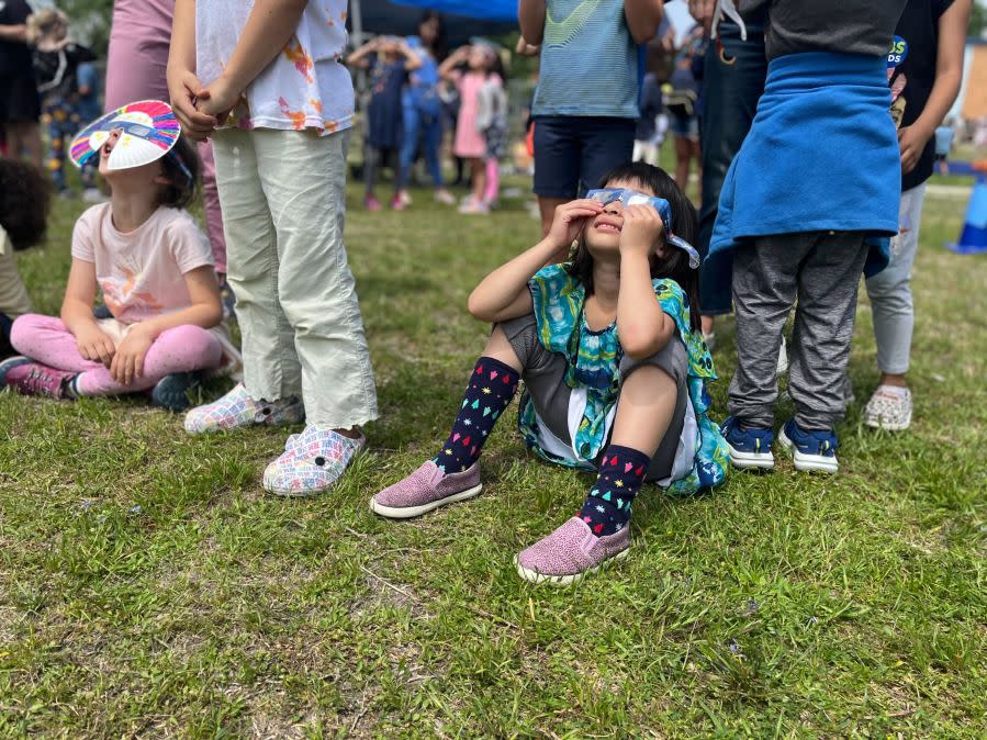 Kids at Reilly Elementary School in Austin, Texas, watch the total solar eclipse. (KXAN Photo/Kelly Wiley)